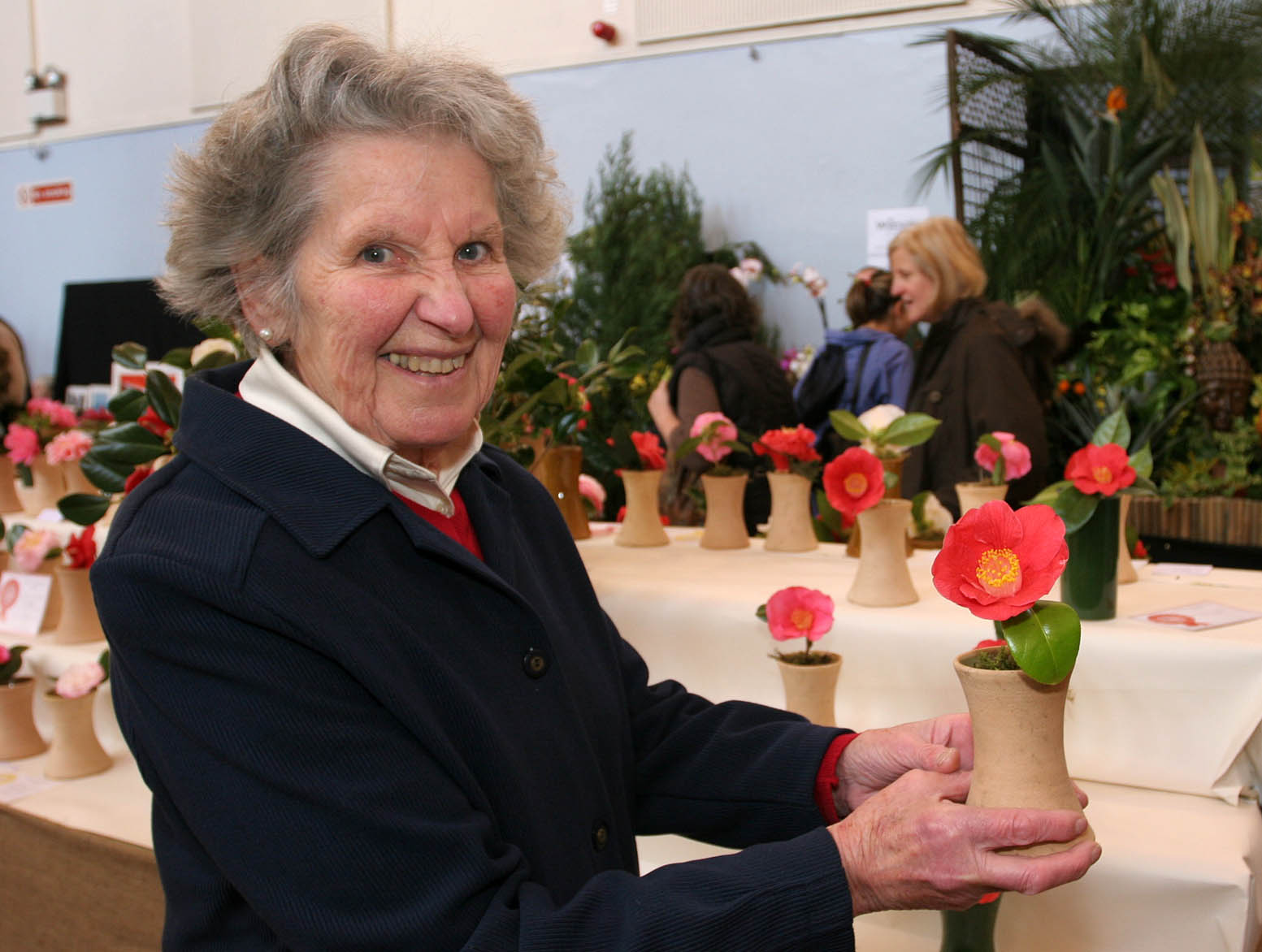 The 84th West Cornwall Spring Show organised by The West Cornwall Horticultural Society in St JohnÕs Hall Penzance. Elizabeth Bolitho with her 1st prize winning Camellia. Pic by Roger Pope/CIOSP